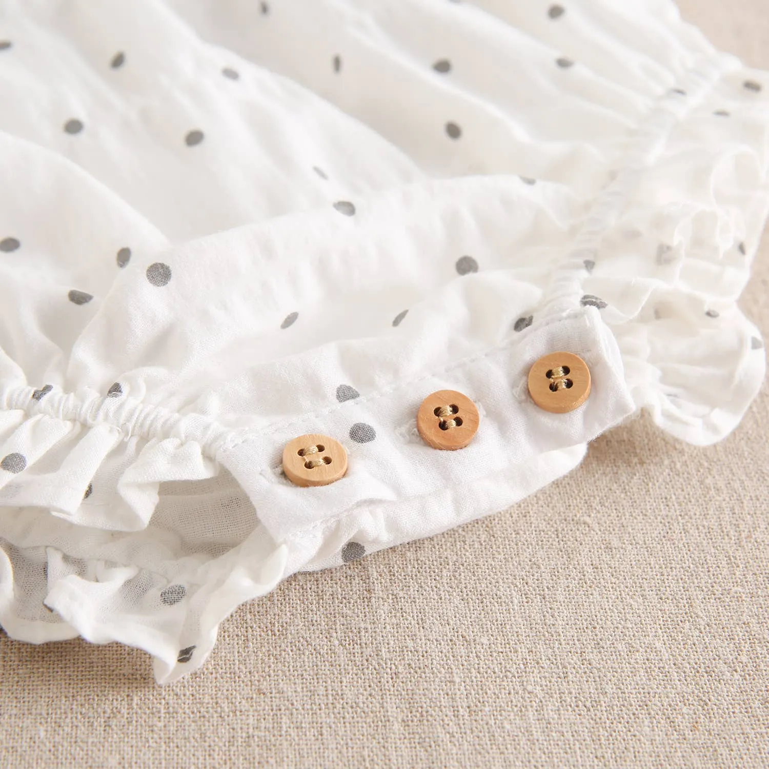 Baby girl's frog printed with gray polka dots