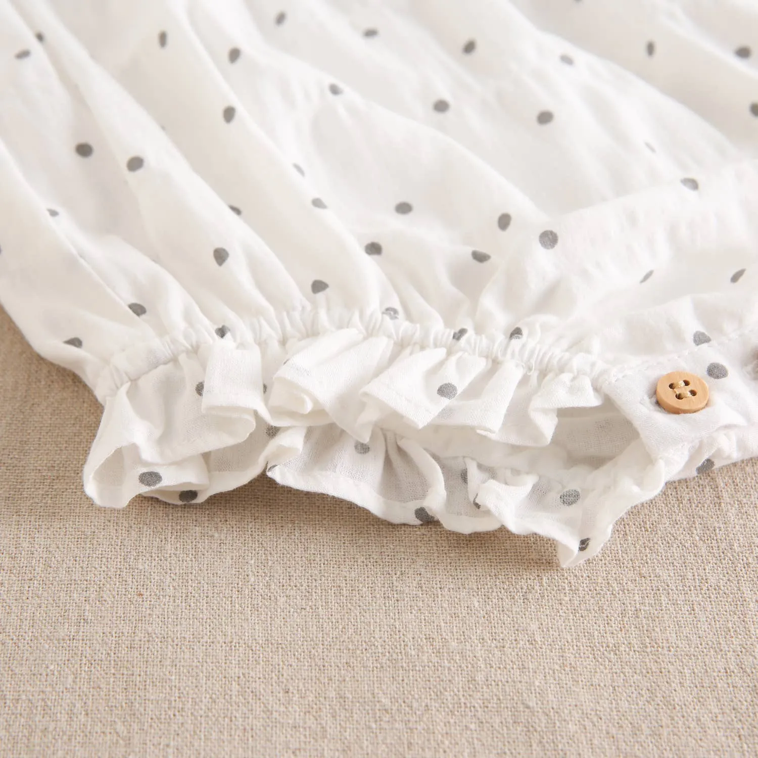 Baby girl's frog printed with gray polka dots