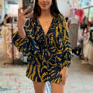 Ocean Breeze Smocked V-Neck Ruffled Geo Printed Romper