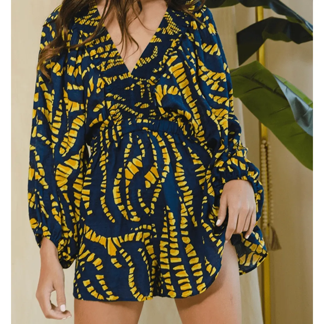 Ocean Breeze Smocked V-Neck Ruffled Geo Printed Romper